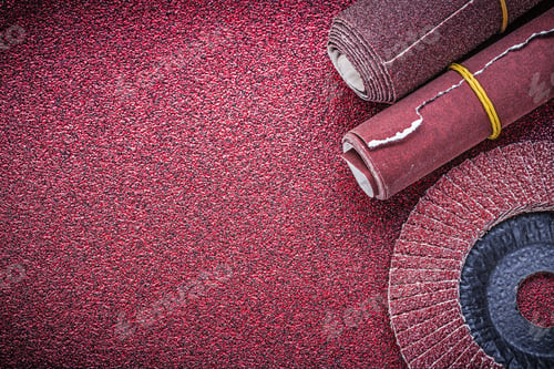Preview: Rolled Up Glass-Paper Flap Grinding Wheel On Abrasive Sheet.