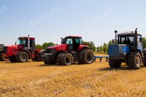 Preview: Agricultural Tractor Plowing A Field Before Sowing
