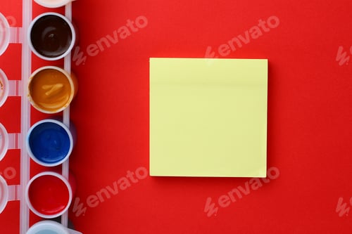 Preview: Blank Sticker For Inscription Or Text On The Background Of Multi-Colored Paint Jars. Blank For