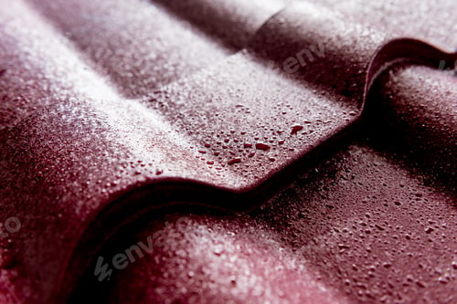Preview: Red Metallic Roof Tiles Background With Drops Of Water.
