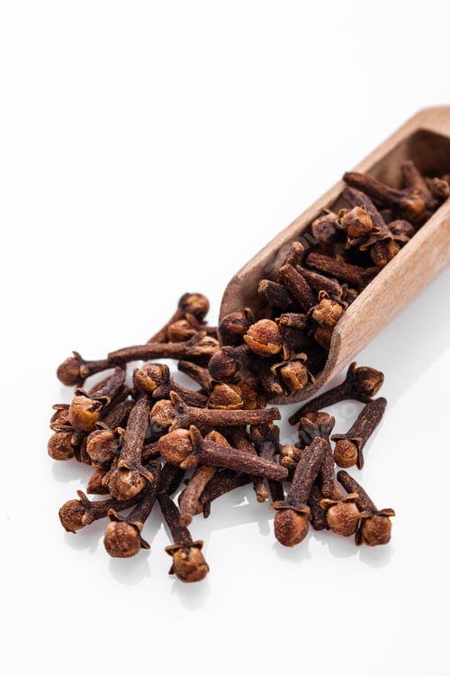 Preview: Fragrant Cloves On A White Acrylic Background