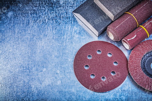 Preview: Set Of Abrasive Tools On Metallic Background.