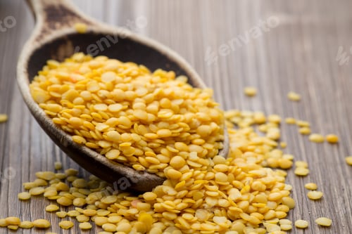 Preview: Lentils Wooden Spoon On Wooden Background. Healthy Food.