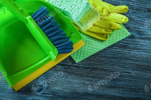 Preview: Dustpan Brush Sponges Protective Gloves Dishcloth On Wooden Board.