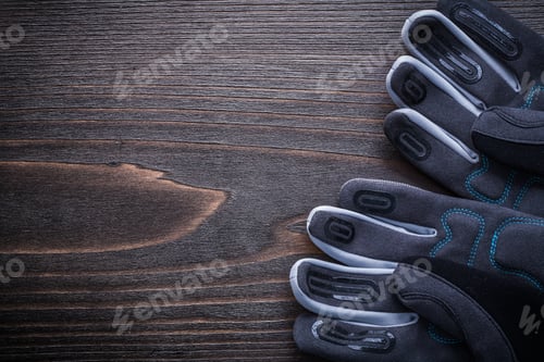 Preview: Agriculture Protective Gloves On Vintage Wooden Board Copy Space.