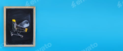 Preview: School Chalkboard With A Shopping Cart And Computer Mouse On Blue Background. Back To School