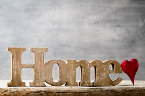 Preview: Home. Decor Home. Message Written In Heart Wooden Blocks.