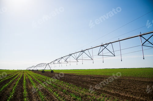 Preview: Automated Farming Irrigation Sprinklers System On Cultivated Agricultural Landscape Field