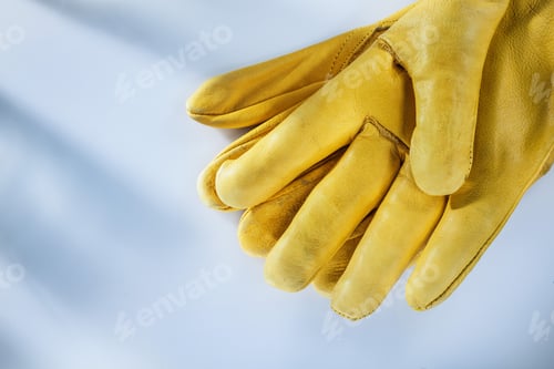 Preview: Pair Of Leather Safety Gloves On White Background.