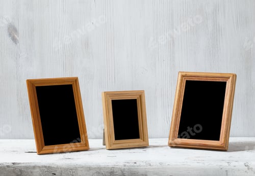 Preview: Photo Frames On Old White Table