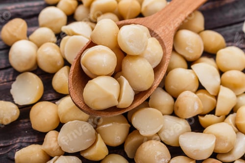Preview: Delicious Macadamia Nuts On A Wooden Rustic Background