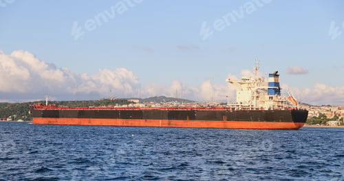 Preview: A Cargo Ship Carrying Goods Between Ports