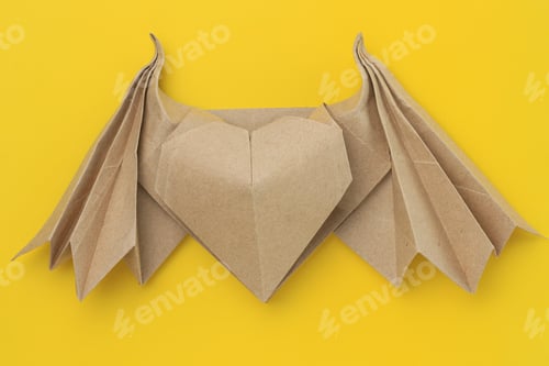 Preview: Origami Paper Heart Mockup. Selective Focus. Bright Yellow Background