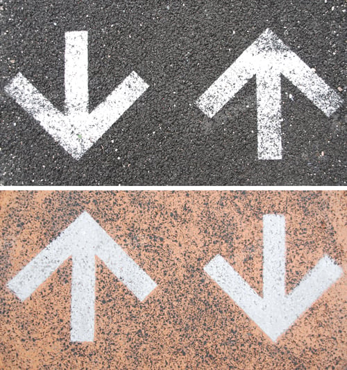 Preview: Set Of Directional Arrow Signs On The Asphalt Road