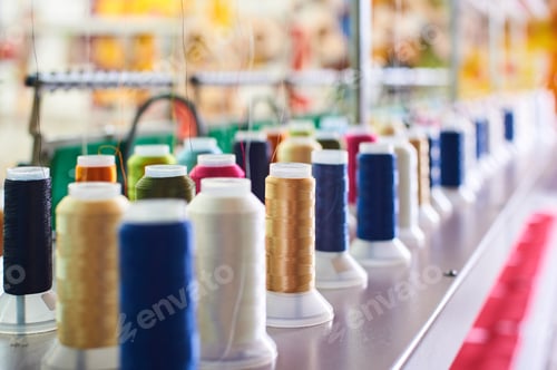 Preview: Closeup Colorful Spool Of Thread On The Sewing Equipment, Fabric And Textile Industry, Embroidery