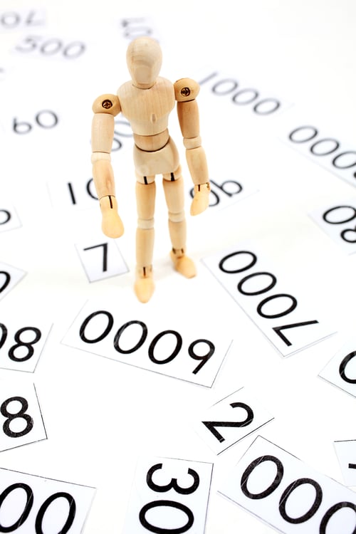 Preview: Manikin Man Standing In A Sea Of Numbers