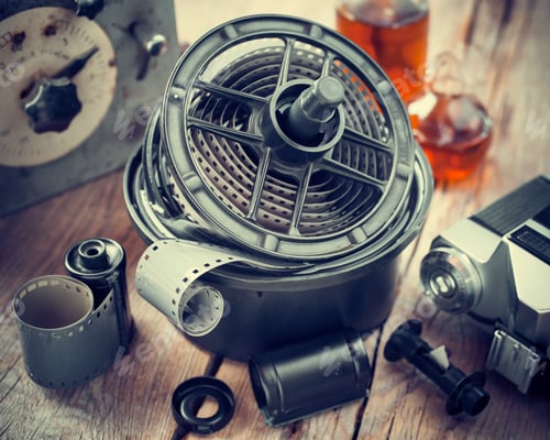 Preview: Developing Tank With Its Film Reels, Photo Film Rolls, Cassette, Retro Camera And Chemical Reagents.