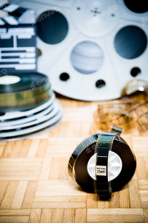 Preview: 35 Mm Cinema Movie Filmstrip With Picture Start Frame And Other Movie Objects Background Vertical