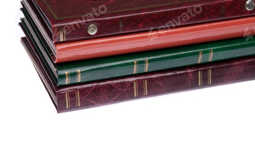Preview: Pile Of Antique Photo Albums Isolated On White Background