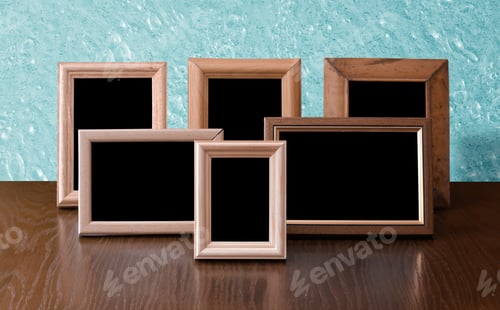 Preview: Wooden Photo Frames On Table, Blue Wall