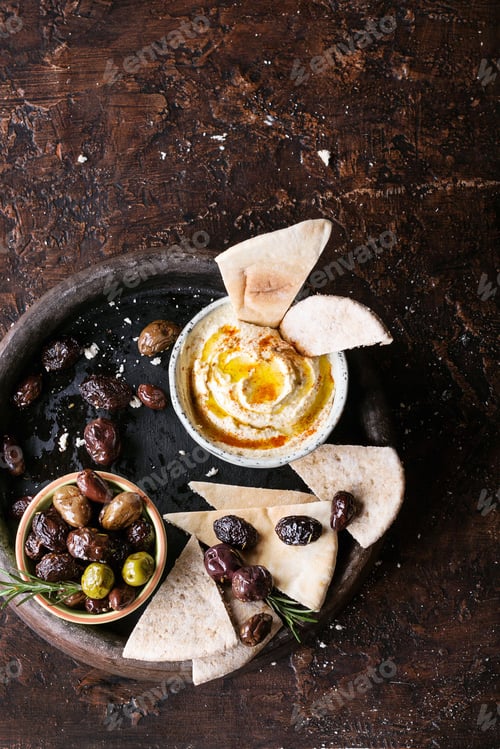 Preview: Traditional Middle East Appetizer Hummus Served With Fresh Pita Bread, Olives, Herbs, Seasoned With