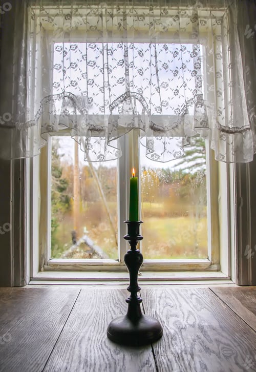 Preview: Green Candle In Vintage Copper Candle Holder On Wooden Table Near The Window In Country House