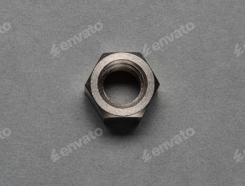 Preview: Metal Nut On Grey Background.