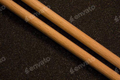 Preview: Two Wooden Stick On Dark Background.