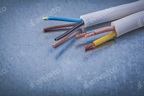 Preview: Electric Cables Wires On Scratched Metallic Background Construction Concept.