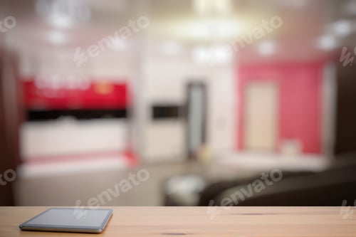 Preview: Tablet On Wooden Table In The Living Room