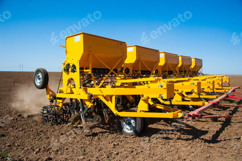 Preview: Farmer In Tractor Preparing Farmland With Seedbed For The Next Year