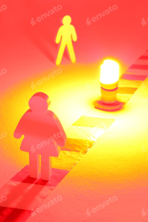 Preview: Warning Light On Chevron And Two Wooden Figures Standing In The Glow