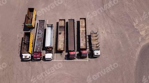 Preview: Trucks Stand In A Row Parking Lot - Top View From The Drone