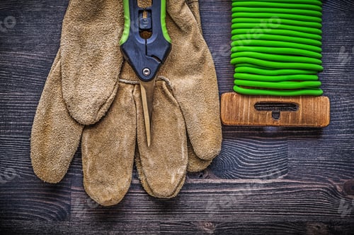 Preview: Garden Pruner Soft Wire Tie Protective Gloves On Vintage Wooden Board Gardening Concept.