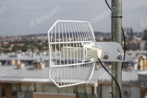 Preview: Parabolic Grid Antenna On Apartment Building. Made With Shallow Depth Of Field.