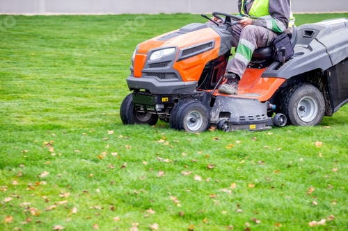 Preview: Professional Lawn Mower In Motion, Cutting The Lawn. Cutting The Grass In A Park.