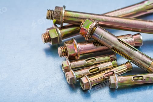 Preview: Close-Up View Of Metal Anchor Bolts With Construction Nuts On Metallic Background Repairing Concept