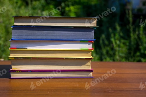 Preview: Stack Of The Books On Wooden Table Outdoor