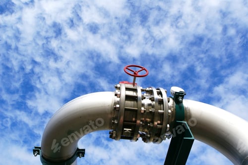 Preview: Industrial Pipelines And Valve With A Natural Blue Background