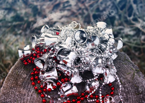 Vista previa: Decorative Silver Bells And Red Beads On Wooden Surface Outdoors.