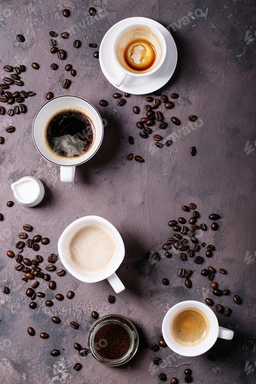 Preview: Fresh Coffee In White Ceramic Cups Over Brown Texture Brown Background. Top View, Flat Lay