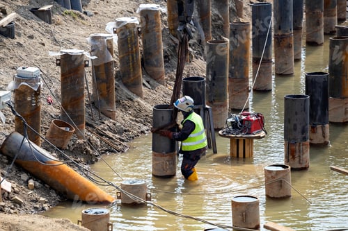 Preview: River Bank Revetment Construction Site. Welding Industrial Construction For Erosion Control.