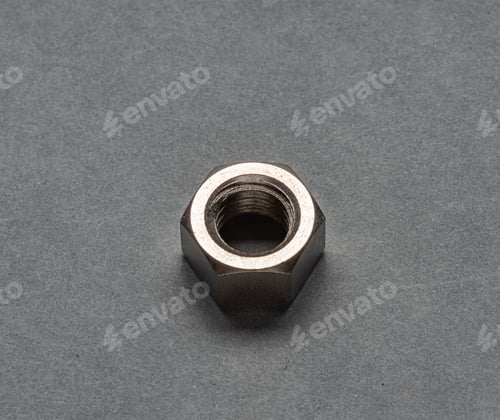 Preview: Metal Nut On Grey Background.