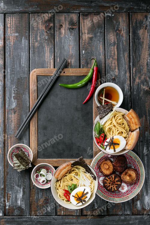 Preview: Two Bowls Of Home Made Pork Ramen Decorated With Chillies, Shiitake, Nori And Scallions With A