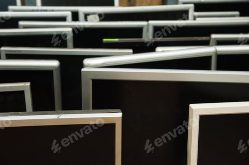 Preview: Stacked Computer Monitor Array Showing a Recycling Concept