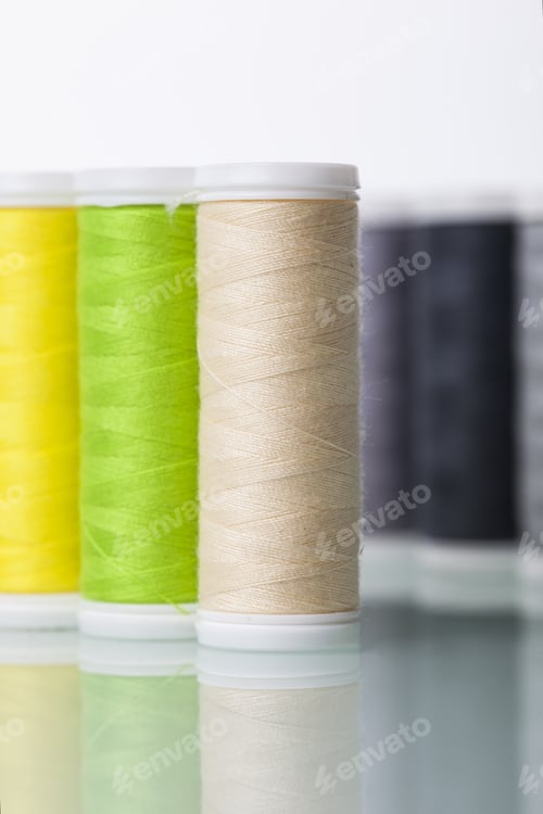 Preview: Sewing Threads Isolated On White Background. Studio Shot