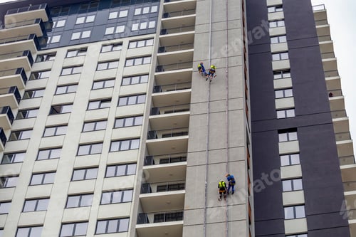 Preview: Workers Hang On The Building And Doing Electrical Installations In Residential Buildings. Men At
