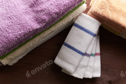 Preview: Many Stacked A Pile Of Towels On Wooden Table