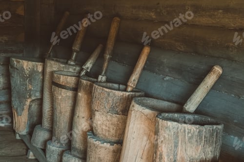 Preview: Old Wooden Mortars With Pistils In Them. Old Home Utensils For Grains Grinding.