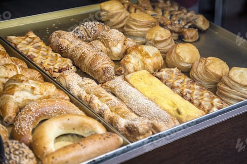 Preview: Pastries And Variety Of Baked Goods In A Bakery Window Display. Selective Focus.